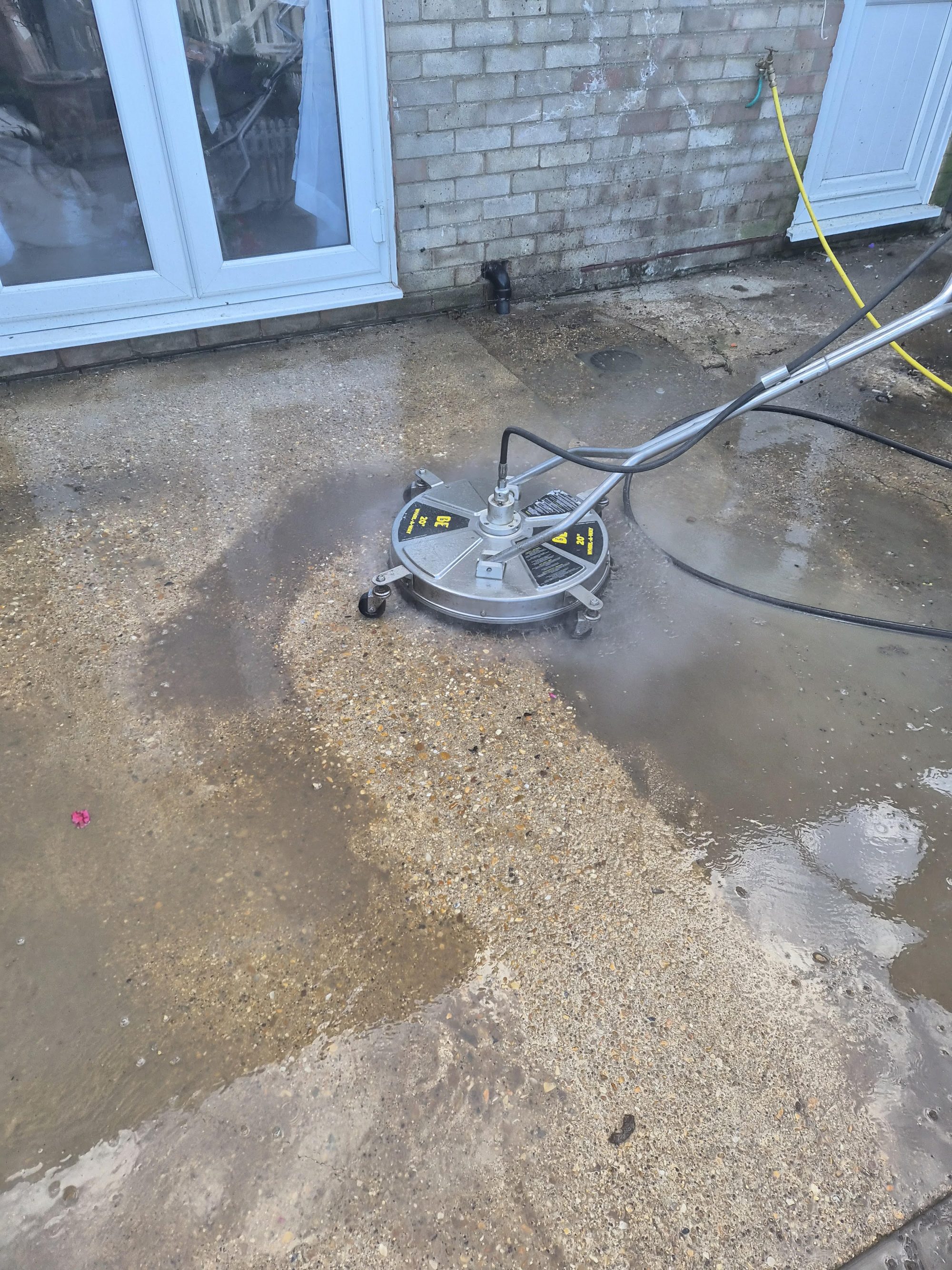 Pressure washer cleaning patio in Huntingdon
